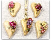 Necklace - Sculpted Heart on a 28" Silk Cord with hand sculpted flowers and hammed metal accents