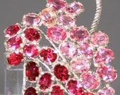 Vintage rhinstone flowerbasket brooch in shades of pink