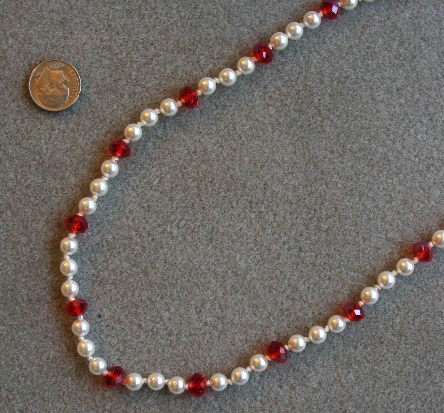 Candy Cane handknotted pearl necklace with Swarovski pearls, crystal, and sterling silver