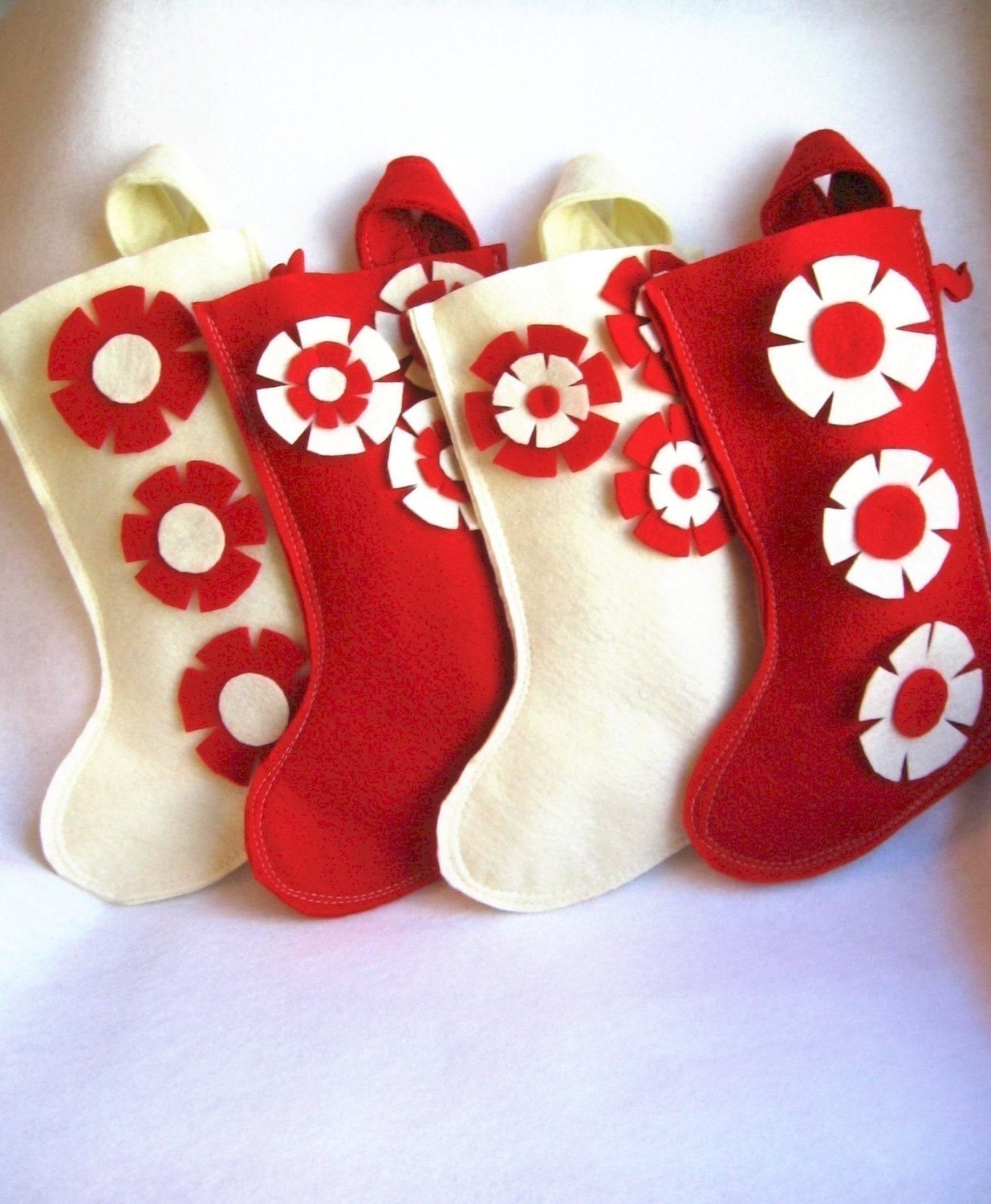 your choice of one Holiday Christmas felt stocking in red and cream / creme / ivory with flowers