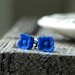 Royal Blue Buttercup . flower post earrings
