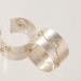 silver cutout hoop with 18k accents