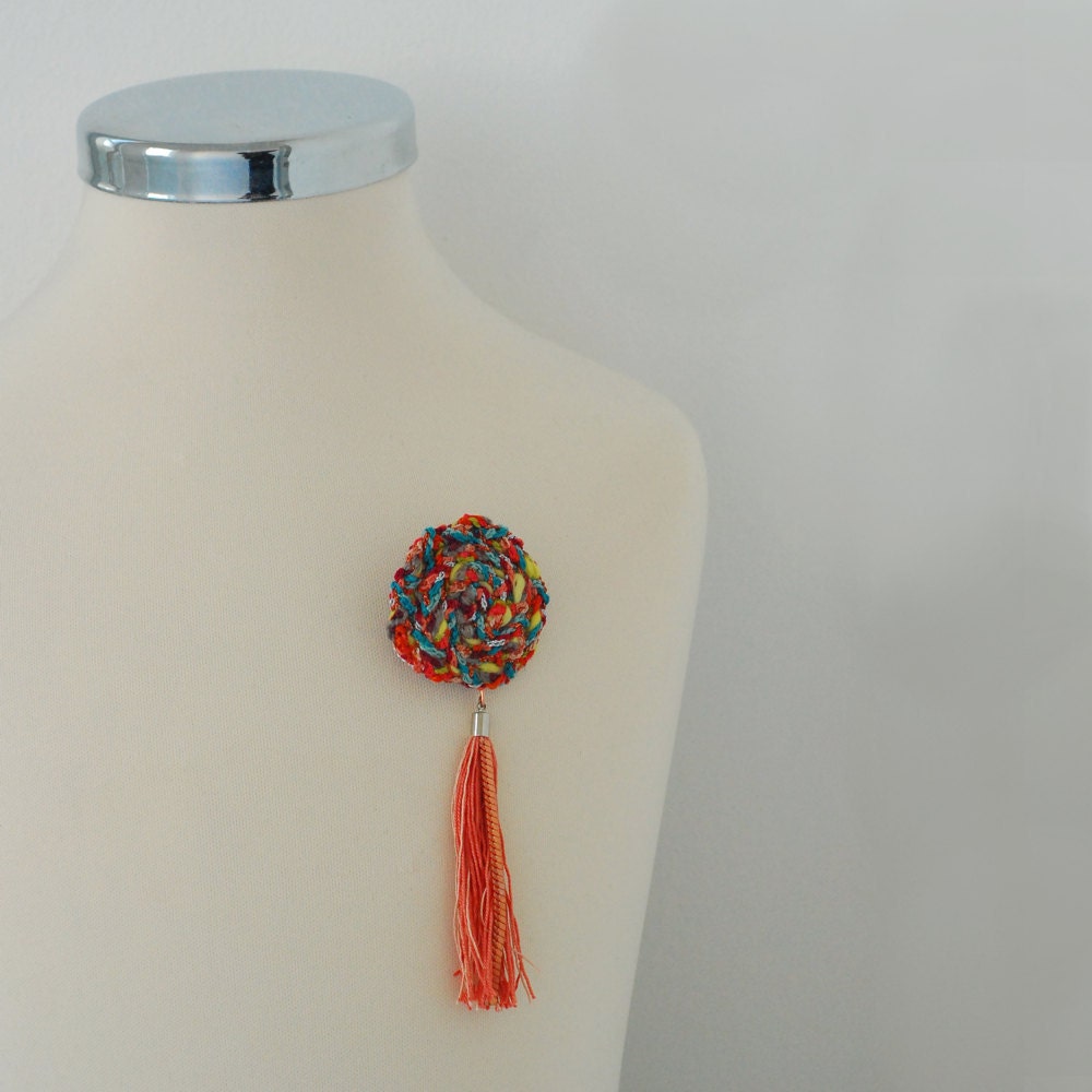 fiber and metal badge
