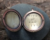 open up and live . a (whispered) soul mantra locket