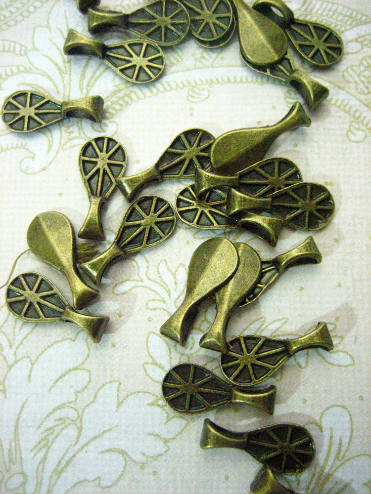 50 teardrop bails, brass plated lead and nickel free glue on flat pad bails for scrabble tiles and other pendants