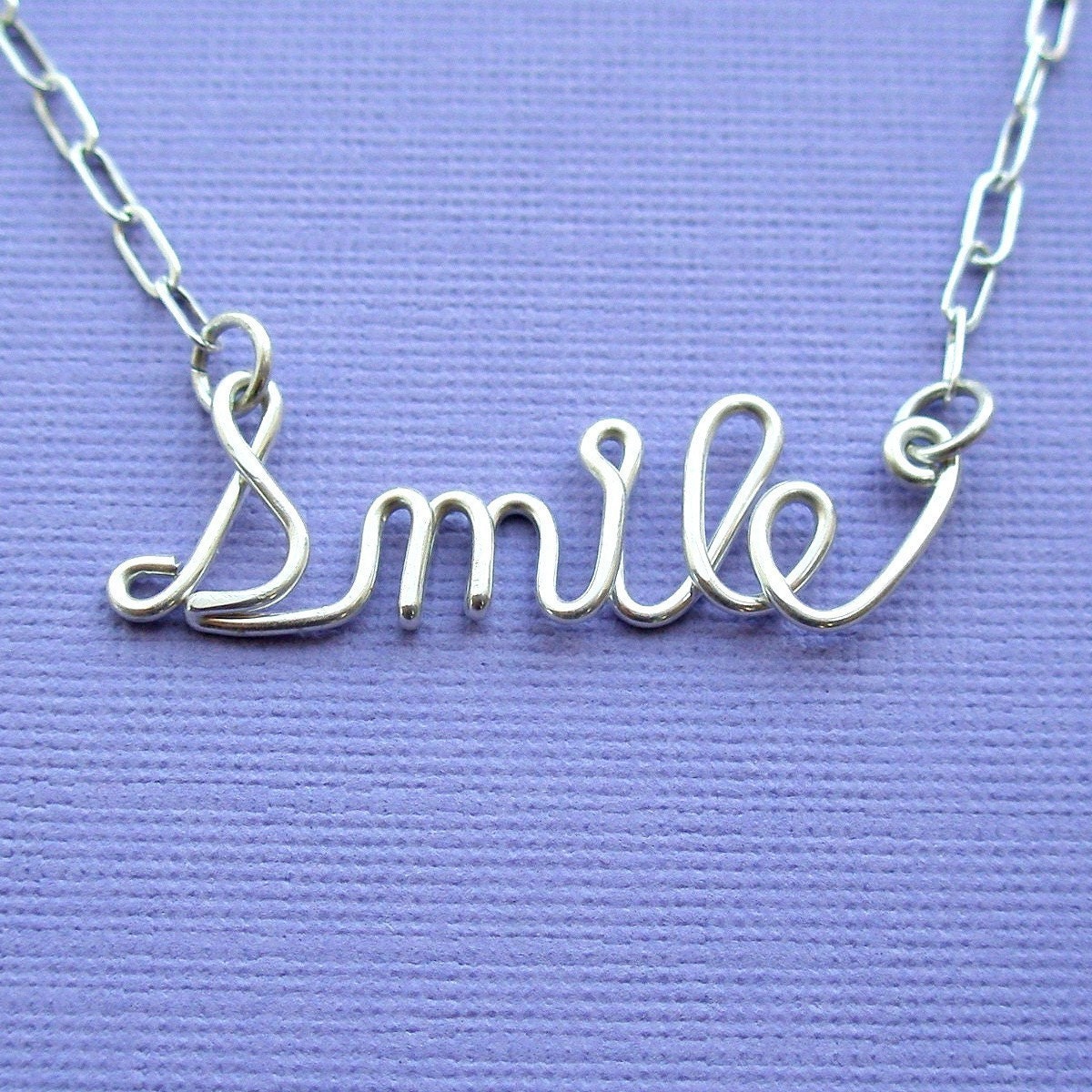 Smile necklace (sterling silver wire word)