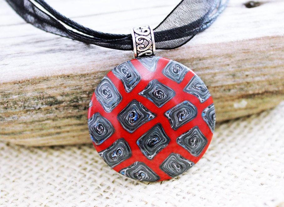 Polymer clay necklace. Custom sized four strand necklace. Polymer clay pendant. Black and red.