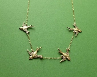 four daring sparrows necklace in gold