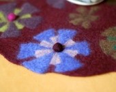 dark wine table mat with felt balls