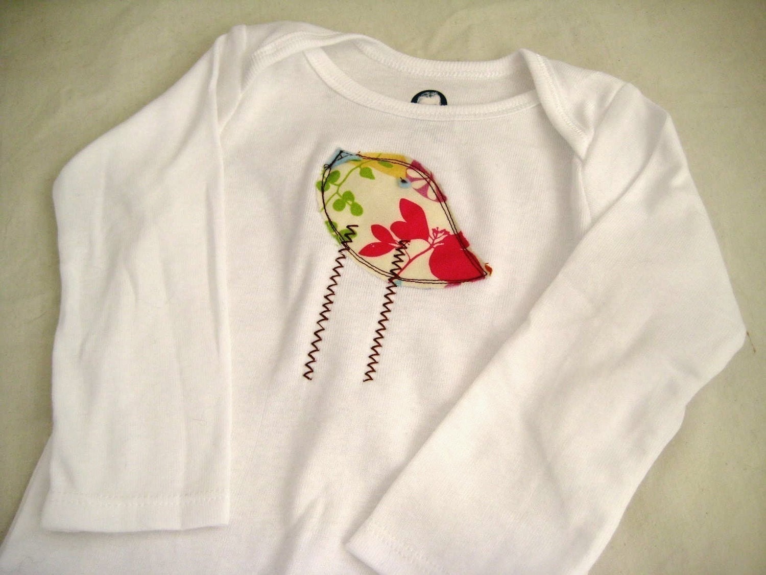 Girly Bird Long Sleeved Onesie 