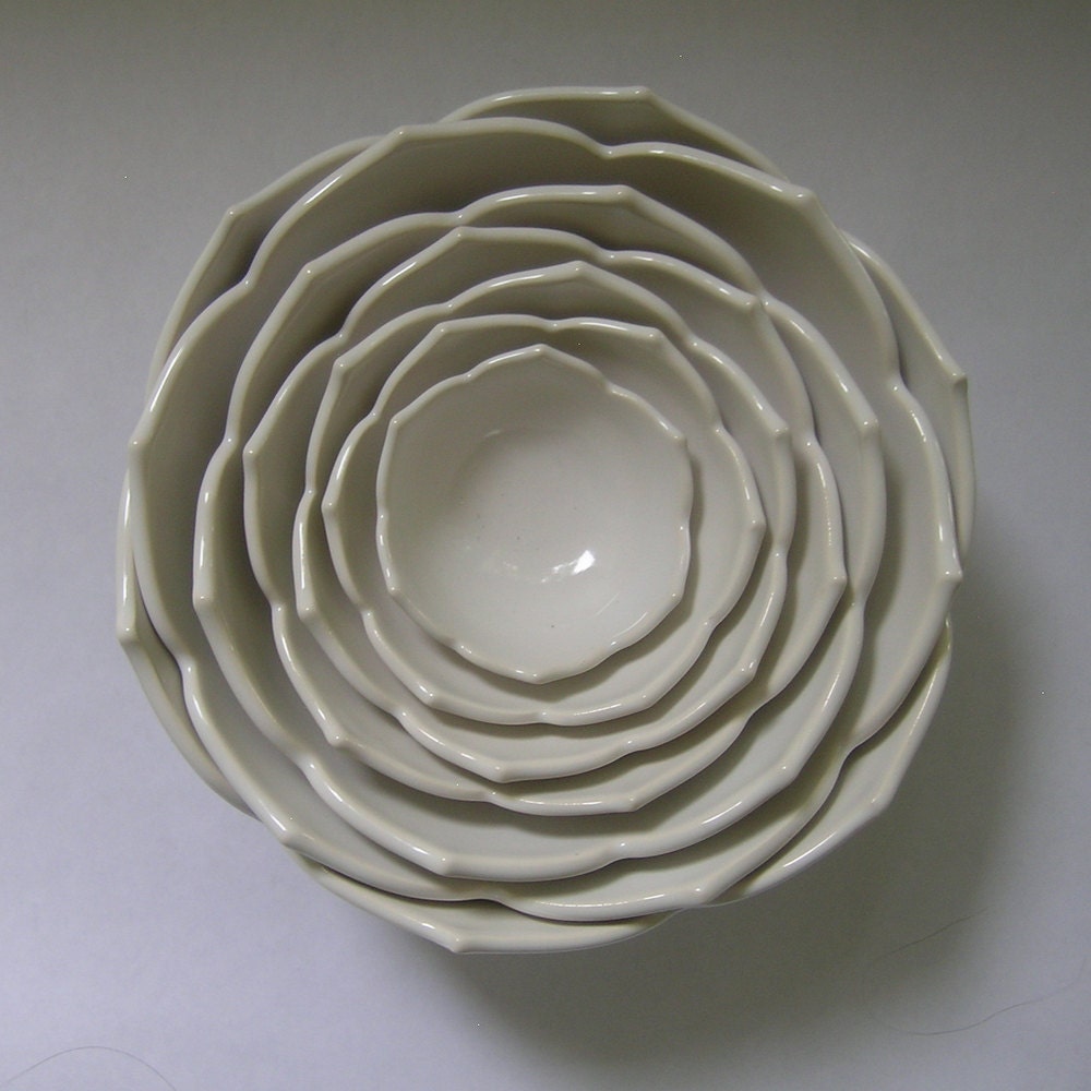 Seven Nesting Lotus Ceramic Bowls in Milk White