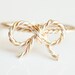 TINY BOW rope ring - mixed metal twisted wire wrap