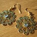 Brass Circle Flower Chandelier Earrings with Rhinestone Like Center