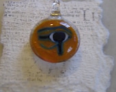 Eye of Ra Pendant Hand Sculpted by Jenn Goodale