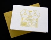 Reel to reel, letterpress card
