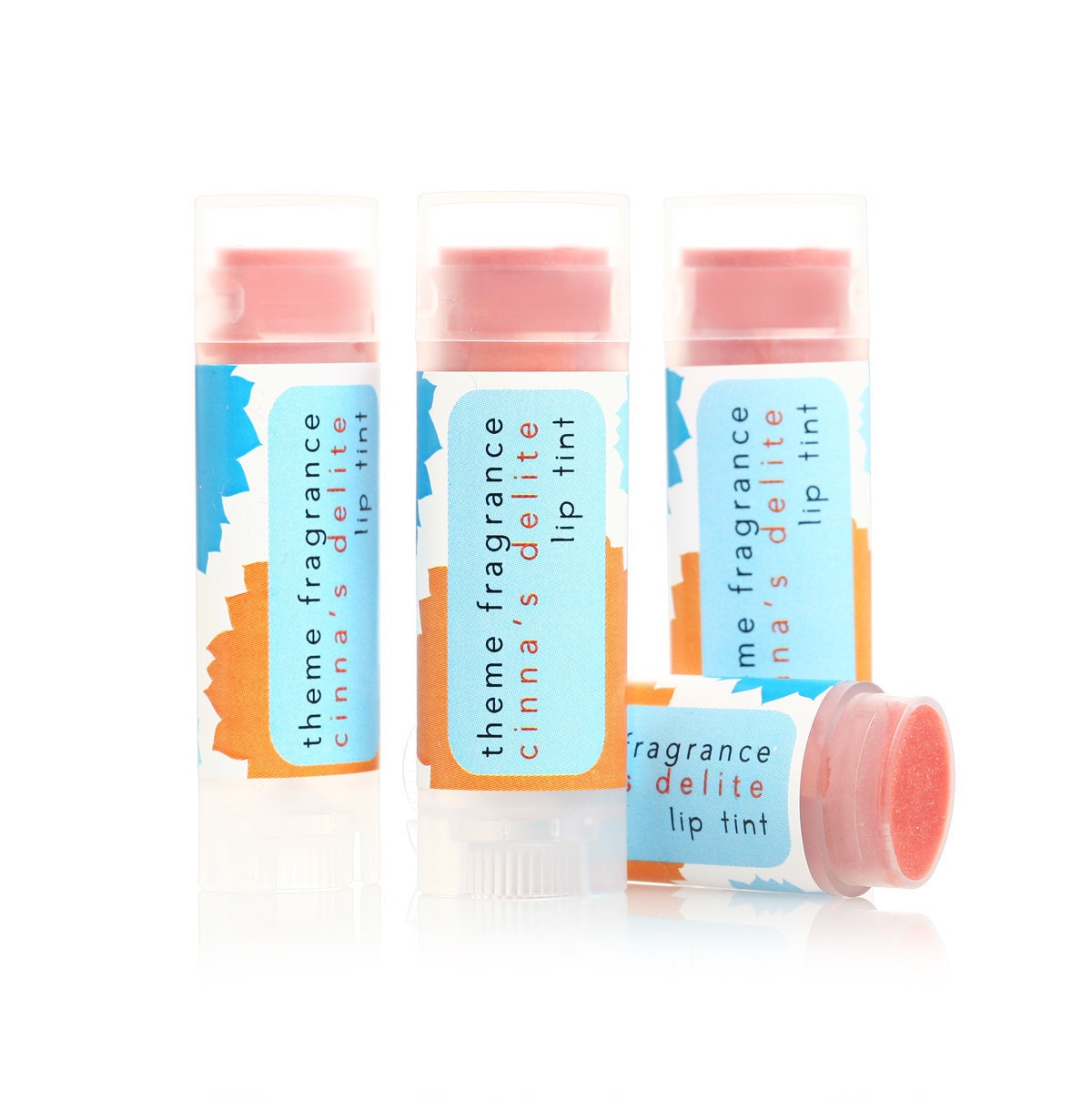 HUNGER GAMES apricot orange glossy lip balm tint - Limited Edition Cinnas Delite Lip Tint Theme Fragrance. Inspired by the Ultimate Stylist.