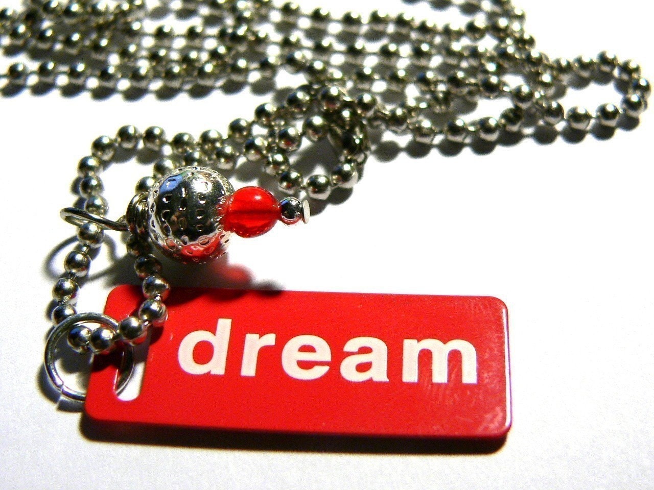 Red Dream Metal Tag Necklace On Silver Steel Chain