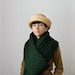 The Snow Leopard in Forest Green