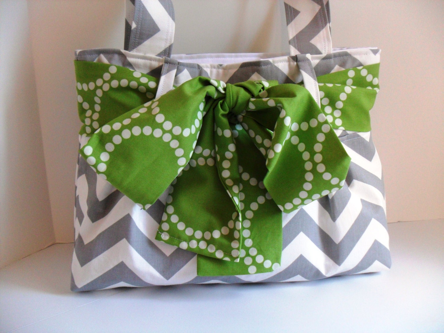 Small Handbag Made of Chevron  Fabric and Green Bow