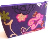 Purple and magenta zippered costmetics pouch