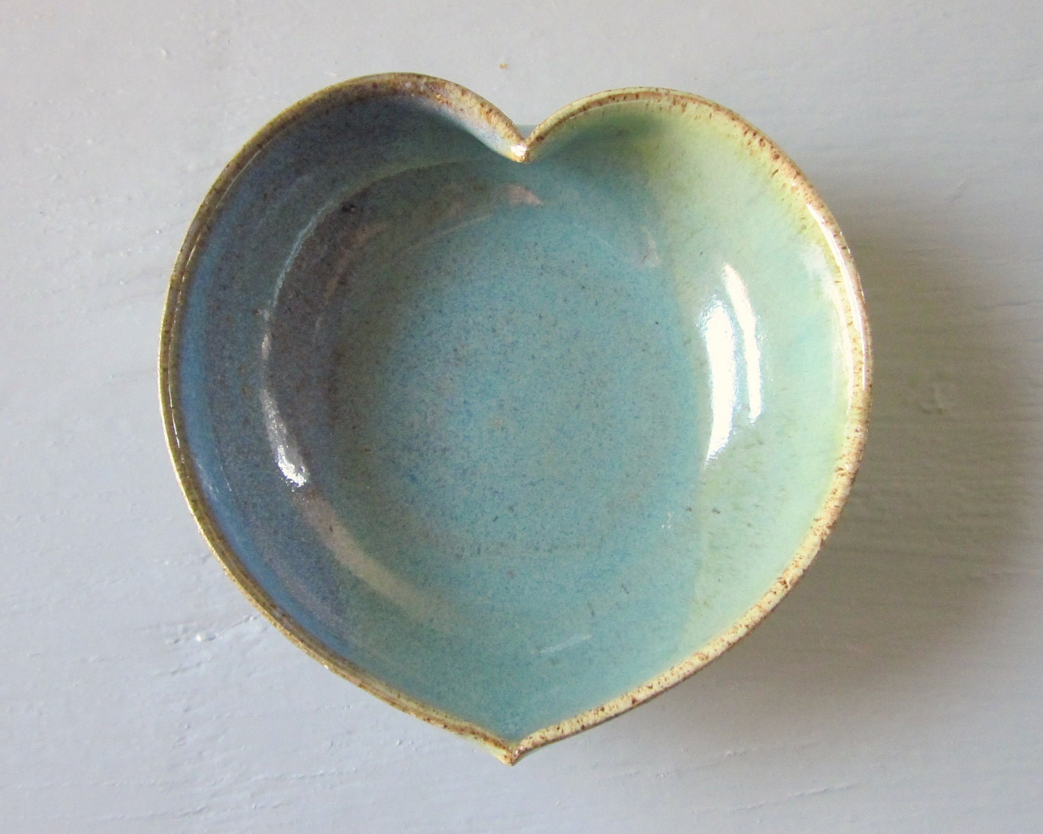 blue/green pottery heart dish - 4 inches