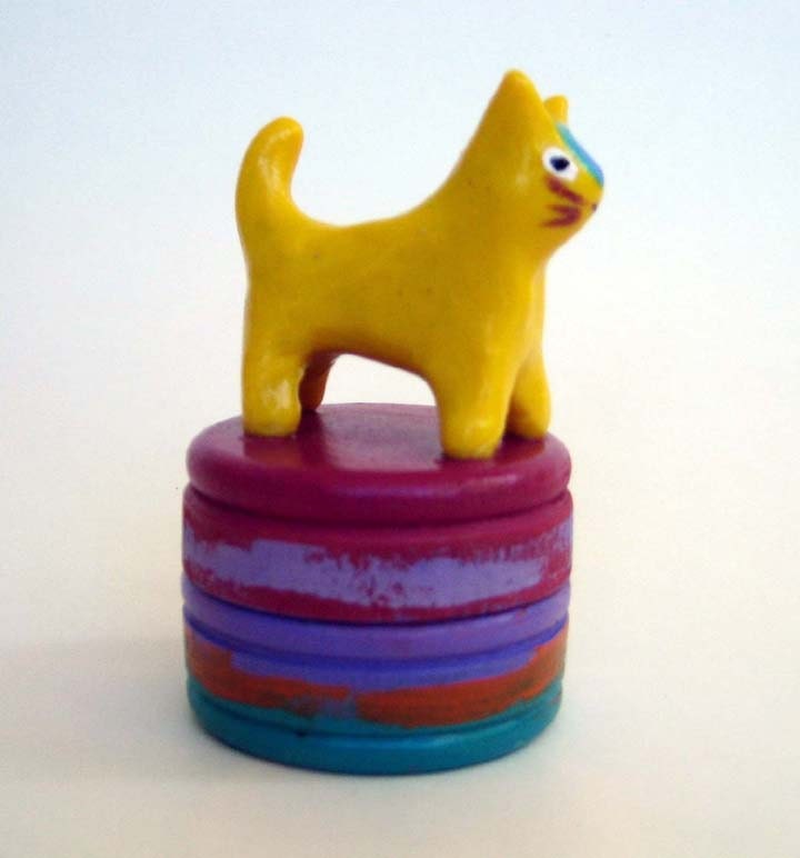Colorful painted box with a animal on top