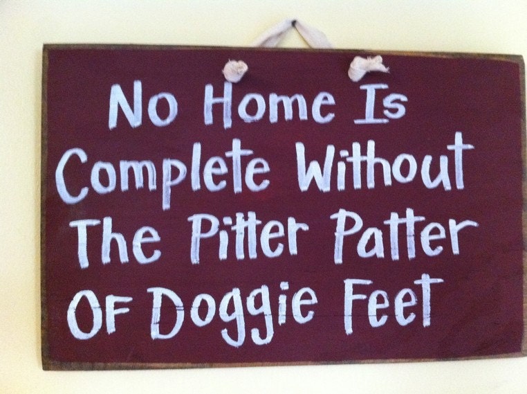 No home is complete without pitter patter of doggie feet sign