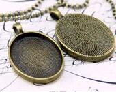 22mm x 30mm Oval Pendant Trays to use with Annie Howes 22mm x 30mm Glamour FX Glass Cabochons. Vintage Gold. 25 Pack