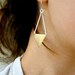 Oblong Arrow earrings in Brass