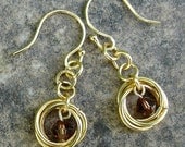 Mobius Love Knot Earrings in Gold with Topaz Brown Crystals