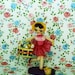 shopping, 8x10 photograph of pose doll and with basket of spun cotton heads