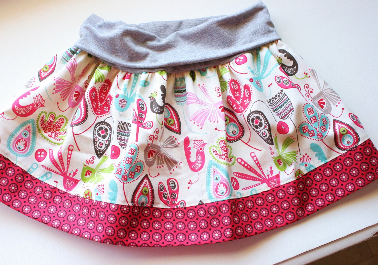 18 mo. Pretty Bird/Pink & Red Trim Skirt with comfortable knit waistband