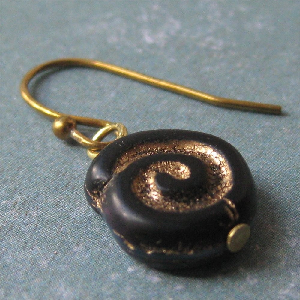 Single black spiral on brass earring for guys or girls