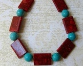 Necklace rectangles of orange sea sponge and turquoise stone