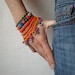 Fuchsia Magdalenae ... Freeform Crochet Cuff - Flowers - Orange Red Blue Lime
