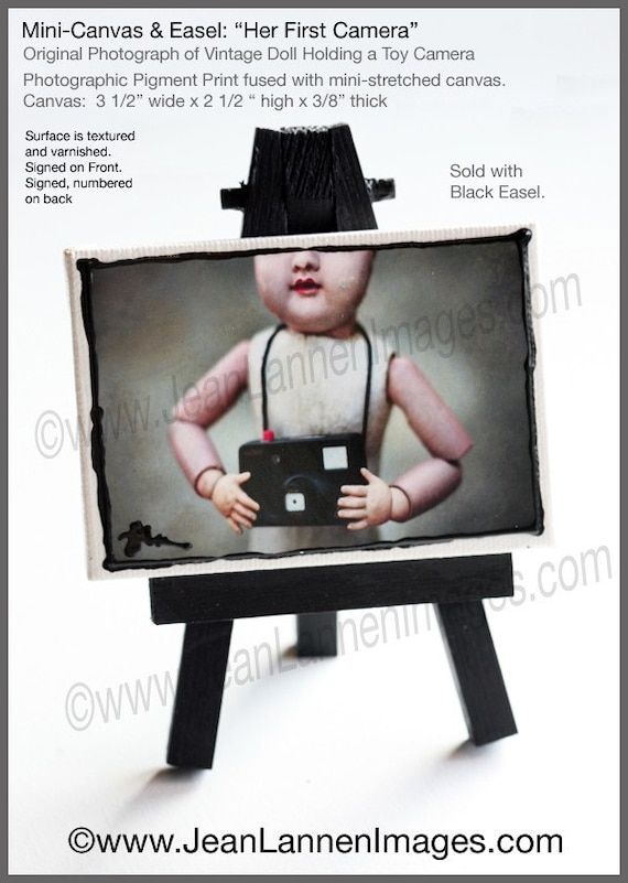 OOAK - Her First Camera, MM Orig Altered Photo on Mini-Canvas w/Easel-Old Creepy Doll w/toy camera, little fingers cute face By Jean Lannen
