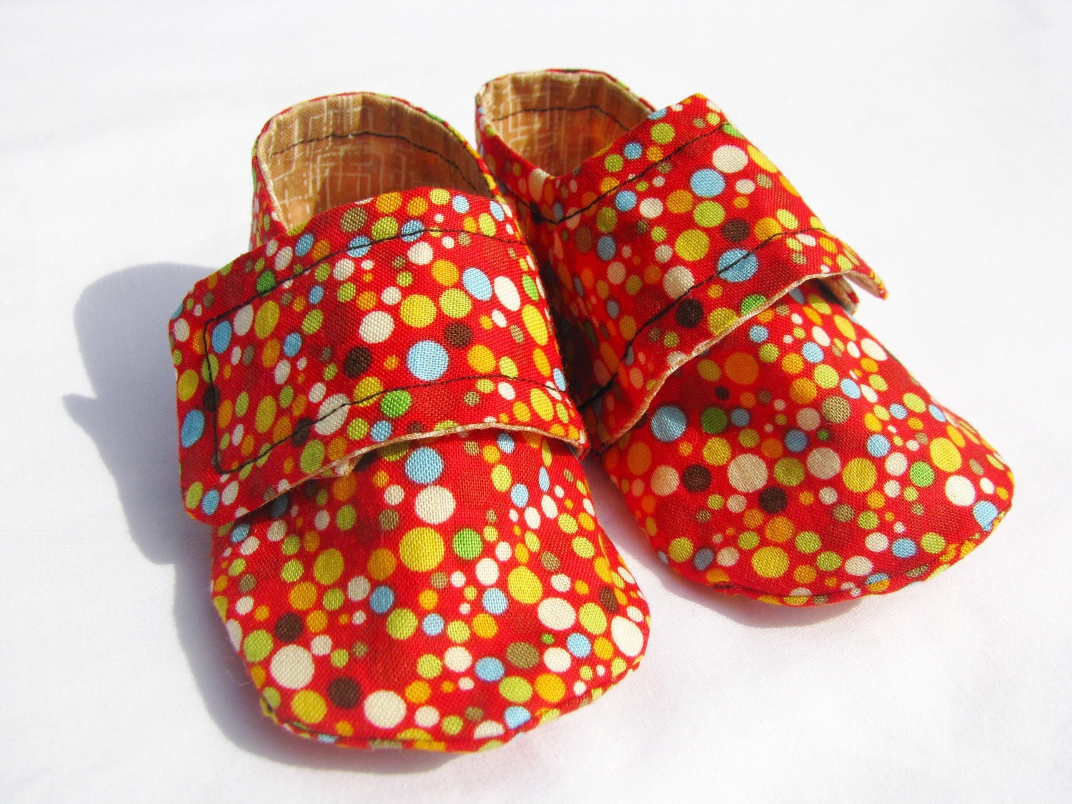 Red Polka Dot lined with tan Sneaker Baby Booties 0 to 6 months