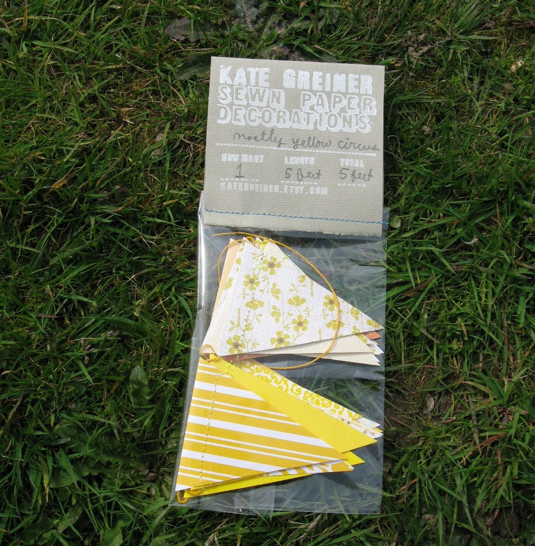 mostly yellow sewn paper circus flag decoration 5 feet