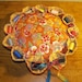 large 8"pincushion with 12 spools of thread