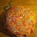 large 8"pincushion with 12 spools of thread