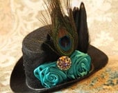Royal Couture - The Mad Hatter  Handmade Mini Top Hat Fascinator Headpiece with Black Lace Peacock Feathers Turquoise Rosettes and Rhinstone
