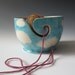 White Cat Yarn Bowl - sculpted kitty against blue sky