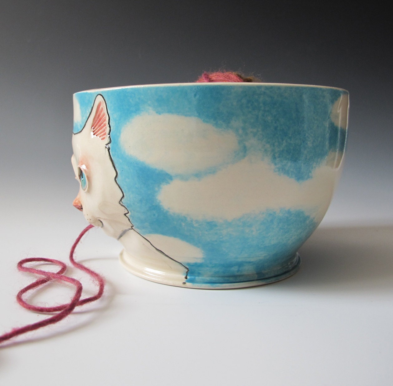 White Cat Yarn Bowl - sculpted kitty against blue sky