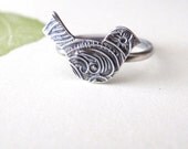 bird ring handcrafted in sterling silver