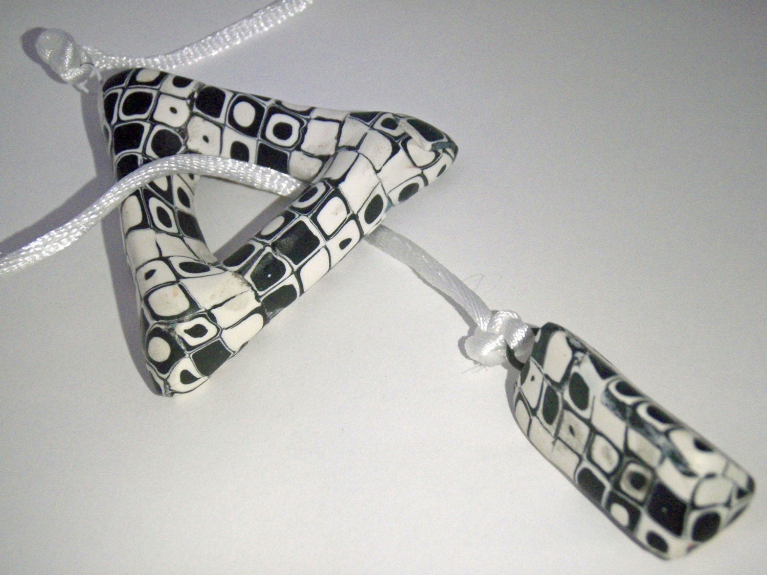 Black and white klimt style triangular toggle necklace