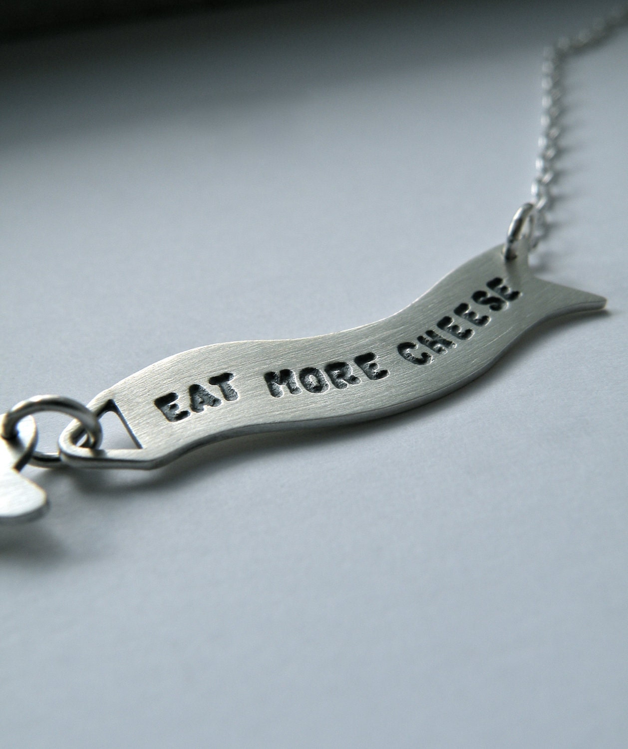 Message in the Sky - silver airplane statement necklace with banner