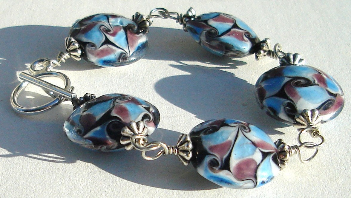 blue purple swirl round glass lampwork bead bracelet