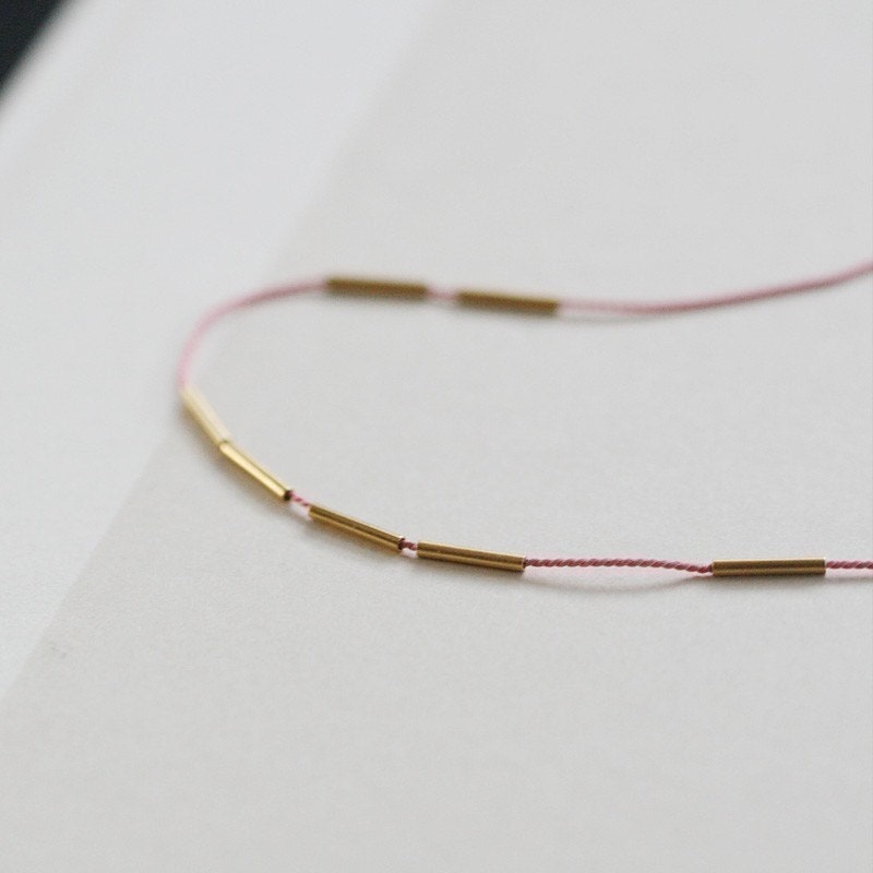 fay - minimalist silk and gold necklace by elephantine