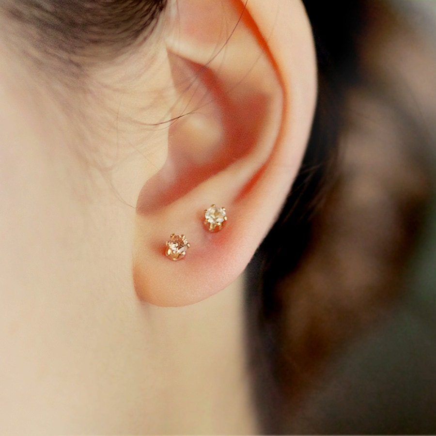 nova trio - tiny gold stud earrings by elephantine