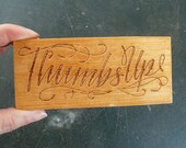 Thumbs Up wood sign